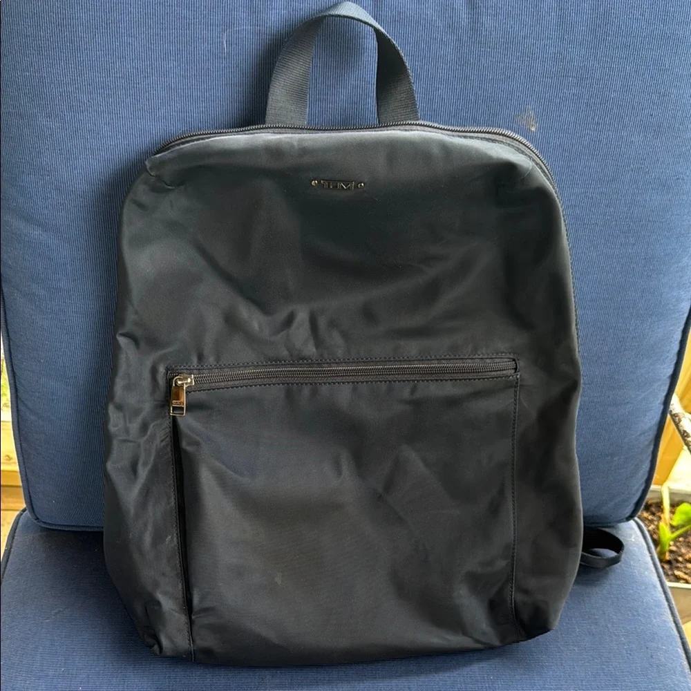Tumi Black Backpack with Minimalist Design and Durable Material